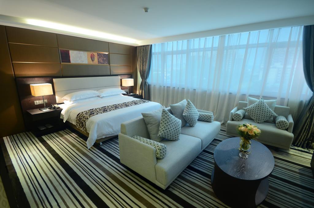 Dongguan Junyue Hotel Habitación foto