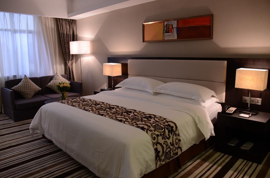 Dongguan Junyue Hotel Habitación foto